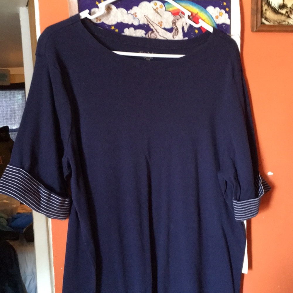 This is a 2x large white stag top!